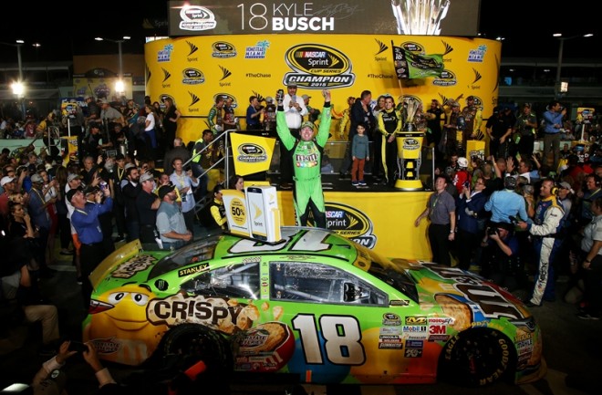 HOMESTEAD, FL - NOVEMBER 22:  Kyle Busch, driver of the #18 M&M's Crispy Toyota, celebrates winning the series championship and the race in Victory Lane after the NASCAR Sprint Cup Series Ford EcoBoost 400 at Homestead-Miami Speedway on November 22, 2015 in Homestead, Florida.  (Photo by Sean Gardner/Getty Images)