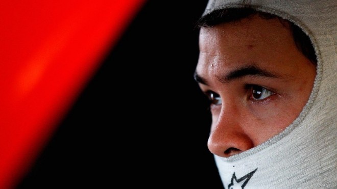 DAYTONA BEACH, FL - FEBRUARY 22: Kyle Larson, driver of the #42 Target Chevrolet, sits in his car in the garage during practice for the NASCAR Sprint Cup Series Daytona 500 at Daytona International Speedway on February 22, 2014 in Daytona Beach, Florida. (Photo by Sean Gardner/Getty Images)