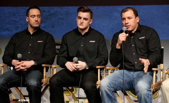 CHARLOTTE, NC - JANUARY 21: Richard Childress Racing drivers Paul Menard and Ty Dillon listen as fellow driver Ryan Newman tells reporters that this team is close to a championship during the NASCAR 2016 Charlotte Motor Speedway Media Tour on January 21, 2016 in Charlotte, North Carolina. (Photo by Bob Leverone/NASCAR via Getty Images)
