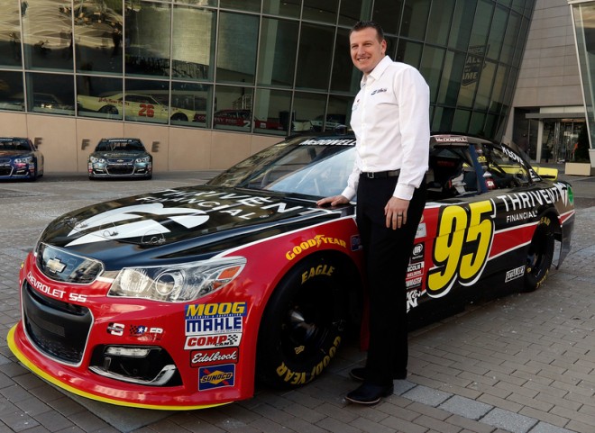 CHARLOTTE, NC - JANUARY 21: Michael McDowell stands with the new Leavine Family Racing number 95 Chevrolet during the NASCAR 2016 Charlotte Motor Speedway Media Tour on January 21, 2016 in Charlotte, North Carolina. Bob Leverone / NASCAR via Getty Images (Photo by Bob Leverone/NASCAR via Getty Images)