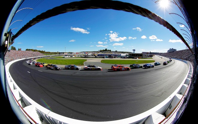 LOUDON, NH - SEPTEMBER 23:  Car race during the NASCAR Sprint Cup Series SYLVANIA 300 at New Hampshire Motor Speedway on September 23, 2012 in Loudon, New Hampshire.  (Photo by Todd Warshaw/Getty Images for NASCAR)