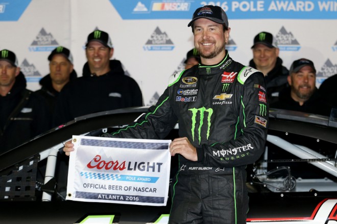 HAMPTON, GA - FEBRUARY 26: Kurt Busch, driver of the #41 Monster Energy/Haas Automation Chevrolet, poses with the Coors Light Pole Award after qualifying for pole position for the NASCAR Sprint Cup Series Folds of Honor QuikTrip 500 at Atlanta Motor Speedway on February 26, 2016 in Hampton, Georgia. (Photo by Matt Hazlett/Getty Images)