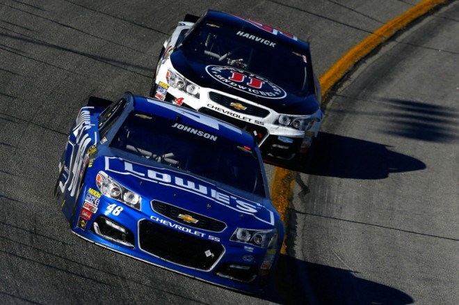 HAMPTON, GA - FEBRUARY 28: Jimmie Johnson, driver of the #48 Lowe's Chevrolet, leads Kevin Harvick, driver of the #4 Jimmy John's Chevrolet, during the NASCAR Sprint Cup Series Folds of Honor QuikTrip 500 at Atlanta Motor Speedway on February 28, 2016 in Hampton, Georgia. (Photo by Jeff Zelevansky/Getty Images)