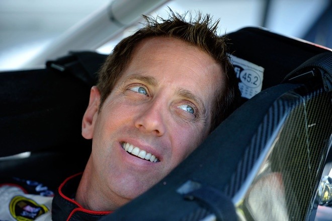 BRISTOL, TN - MARCH 17: Greg Biffle, driver of the #16 3M/811 Ford, sits in his car in the garage area during practice for the NASCAR Sprint Cup Series Food City 500 at Bristol Motor Speedway on March 17, 2012 in Bristol, Tennessee. (Photo by Rainier Ehrhardt/Getty Images for NASCAR)