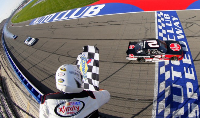 FONTANA, CA - MARCH 19:  Austin Dillon, driver of the #2 Rheem Chevrolet, takes the checkered flag to win the NASCAR Xfinity Series TreatMyClot.com 300 at Auto Club Speedway on March 19, 2016 in Fontana, California.  (Photo by Brian Lawdermilk/NASCAR via Getty Images)