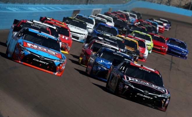 AVONDALE, AZ - MARCH 12:  Erik Jones, driver of the #20 Reser's Fine Foods Toyota, and Kyle Busch, driver of the #18 NOS Energy Drink Toyota, lead a pack of cars during the NASCAR XFINITY Series Axalta Faster. Tougher. Brighter. 200 at Phoenix International Raceway on March 12, 2016 in Avondale, Arizona.  (Photo by Sean Gardner/Getty Images)