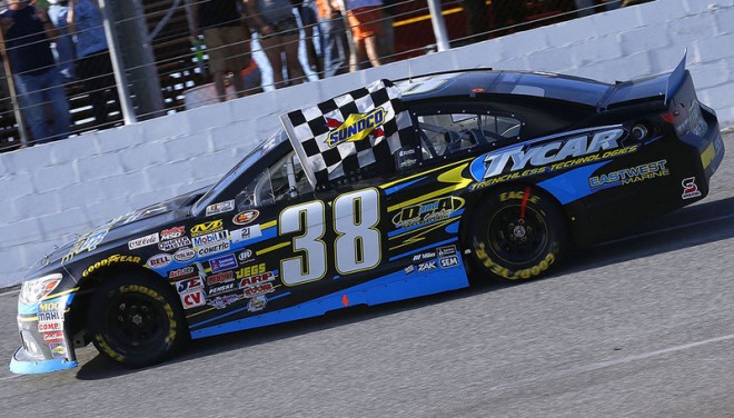 MOBILE, AL - MARCH 13: Tyler Dippel, driver of the #38 East West Marine/TyCar Chevrolet, takes a victory lap after winning the NASCAR K&N Pro Series East Mobile 150 on March 13, 2016 in Mobile, Alabama. (Photo by Jonathan Bachman/NASCAR via Getty Images) *** Local Caption *** Tyler Dippel