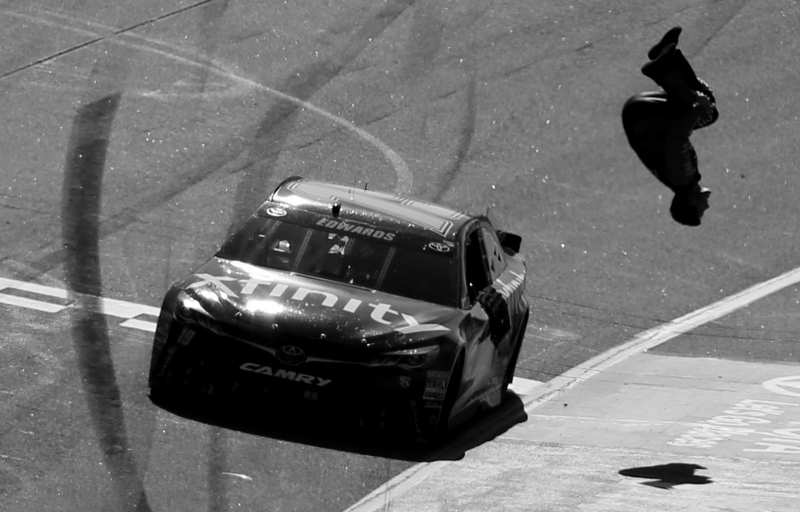 RICHMOND, VA - APRIL 24: Carl Edwards, driver of the #19 XFINITY Toyota, celebrates with a backflip after winning the NASCAR Sprint Cup Series TOYOTA OWNERS 400 at Richmond International Raceway on April 24, 2016 in Richmond, Virginia. (Photo by Todd Warshaw/Getty Images)