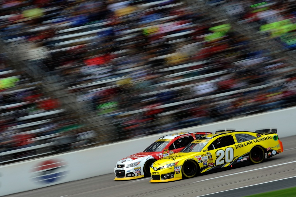 FORT WORTH, TX - NOVEMBER 02: Kevin Harvick, driver of the #4 Budweiser Chevrolet, races Matt Kenseth, driver of the #20 Dollar General Toyota, during the NASCAR Sprint Cup Series AAA Texas 500 at Texas Motor Speedway on November 2, 2014 in Fort Worth, Texas. (Photo by Jared C. Tilton/NASCAR via Getty Images)