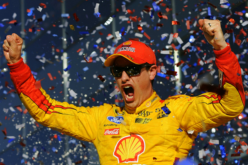 DAYTONA BEACH, FL - FEBRUARY 22: Joey Logano, driver of the #22 Shell Pennzoil Ford, celebrates in victory lane after winning the NASCAR Sprint Cup Series 57th Annual Daytona 500 at Daytona International Speedway on February 22, 2015 in Daytona Beach, Florida. (Photo by Jared C. Tilton/Getty Images)