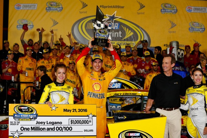 CHARLOTTE, NC - MAY 21: Joey Logano, driver of the #22 Shell Pennzoil Ford, celebrates in Victory Lane after winning the NASCAR Sprint Cup Series Sprint All-Star Race at Charlotte Motor Speedway on May 21, 2016 in Charlotte, North Carolina. (Photo by Jonathan Ferrey/NASCAR via Getty Images)