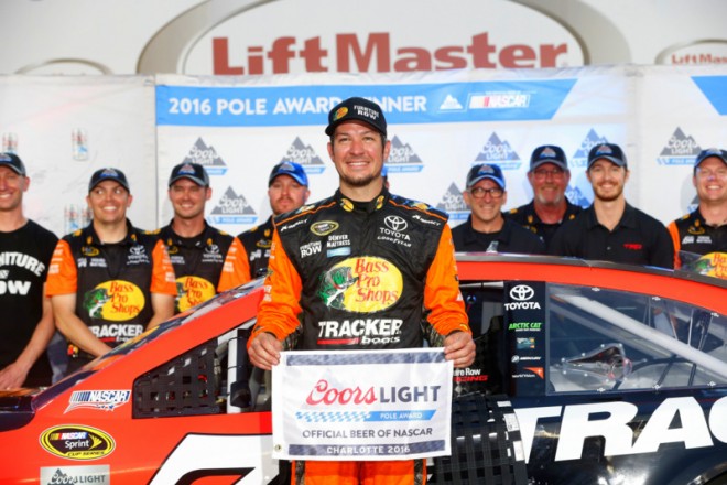 CHARLOTTE, NC - MAY 26: Martin Truex Jr., driver of the #78 Bass Pro Shops/Tracker Toyota, poses with the Coors Light Pole Award after qualifying for pole position for the NASCAR Sprint Cup Series Coca-Cola 600 at Charlotte Motor Speedway on May 27, 2016 in Charlotte, North Carolina. (Photo by Brian Lawdermilk/Getty Images)