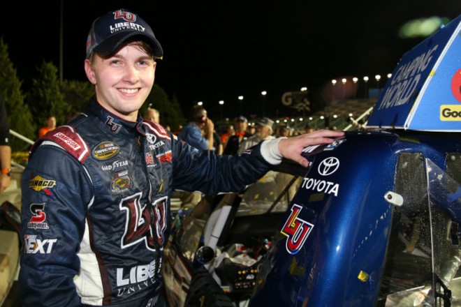 KANSAS CITY, KS - MAY 06:  William Byron, driver of the #9 Liberty University Toyota, celebrates in Victory Lane after winning the NASCAR Camping World Truck Series Toyota Tundra 250 at Kansas Speedway on May 6, 2016 in Kansas City, Kansas.  (Photo by Sean Gardner/NASCAR via Getty Images)