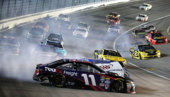 KANSAS CITY, KS - MAY 07: Denny Hamlin, driver of the #11 FedEx Express Freight Toyota, and Brad Keselowski, driver of the #2 Alliance Truck Parts Ford, wreck during the NASCAR Sprint Cup Series Go Bowling 400 at Kansas Speedway on May 7, 2016 in Kansas City, Kansas. (Photo by Jerry Markland/Getty Images)