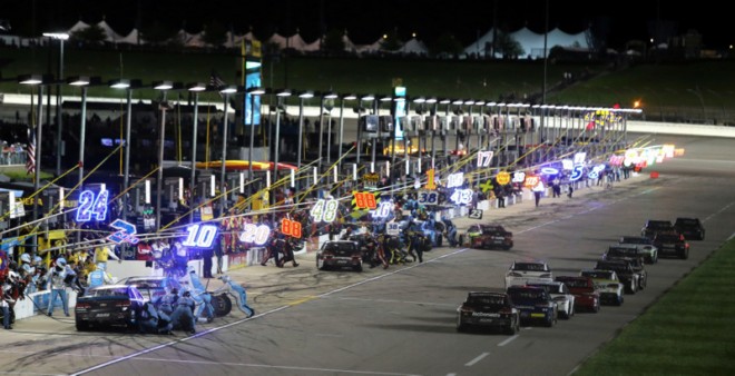 KANSAS CITY, KS - MAY 07: Cars come in to pit during the NASCAR Sprint Cup Series Go Bowling 400 at Kansas Speedway on May 7, 2016 in Kansas City, Kansas. (Photo by Jerry Markland/Getty Images)