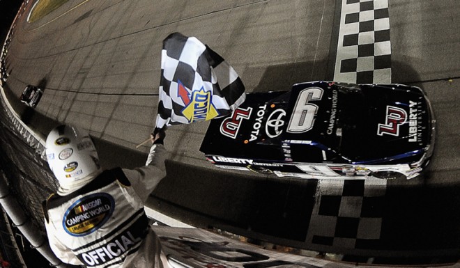 NEWTON, IA - JUNE 18:  William Byron, driver of the #9 Liberty University Toyota, takes the checkered flag during the NASCAR Camping World Truck Series Speediatrics 200 at Iowa Speedway on June 18, 2016 in Newton, Iowa.  (Photo by Jonathan Moore/NASCAR via Getty Images)