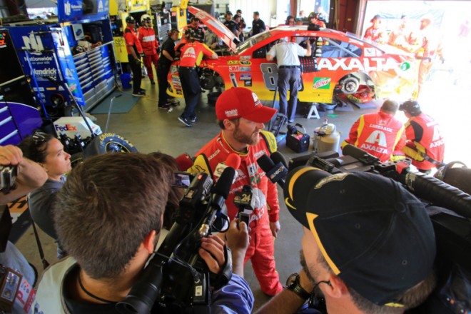 BROOKLYN, MI - JUNE 12:  Dale Earnhardt Jr, driver of the #88 Axalta Chevrolet, speaks to the media in the garage after an on-track incident during the NASCAR Sprint Cup Series FireKeepers Casino 400 at Michigan International Speedway on June 12, 2016 in Brooklyn, Michigan.  (Photo by Daniel Shirey/NASCAR via Getty Images)