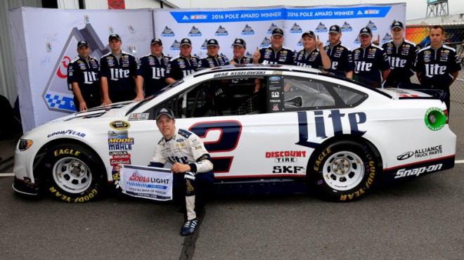 LONG POND, PA - JUNE 03:  Brad Keselowski, driver of the #2 Miller Lite Ford, poses with the Coors Light Pole Award after qualifying on the pole position for the NASCAR Sprint Cup Series Axalta "We Paint Winners" 400 at Pocono Raceway on June 3, 2016 in Long Pond, Pennsylvania.  (Photo by Chris Trotman/NASCAR via Getty Images)