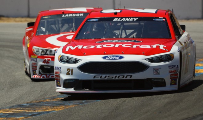 SONOMA, CA - JUNE 24: Ryan Blaney, driver of the #21 Motorcraft/Quick Lane Tire & Auto Center Ford, leads Kyle Larson, driver of the #42 Target Chevrolet, during practice for the NASCAR Sprint Cup Series Toyota/Save Mart 350 at Sonoma Raceway on June 24, 2016 in Sonoma, California. (Photo by Ezra Shaw/Getty Images)