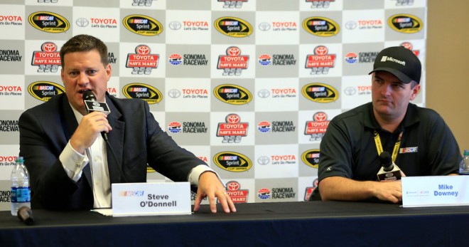 SONOMA, CA - JUNE 24: (R-L) Mike Downey, Microsoft Principal Evangelist for Sports, and NASCAR Executive Vice President and Chief Racing Development Officer Steve O'Donnell speak at a press conference prior to practice for the NASCAR Sprint Cup Series Toyota/Save Mart 350 at Sonoma Raceway on June 24, 2016 in Sonoma, California. (Photo by Chris Trotman/NASCAR via Getty Images)