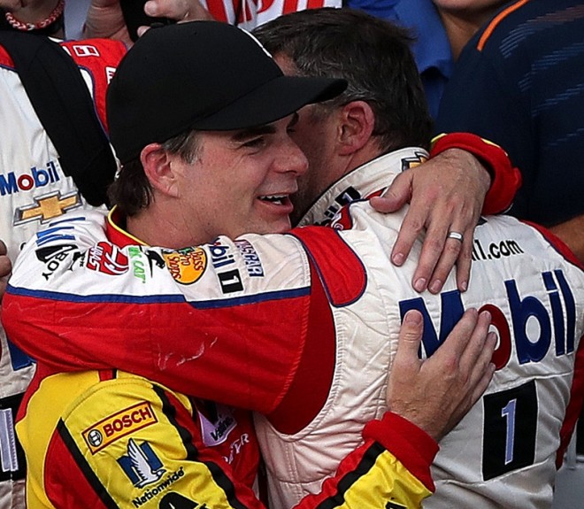 INDIANAPOLIS, IN - JULY 24:  (L-R) Jeff Gordon, driver of the #88 Axalta Chevrolet, hugs Tony Stewart, driver of the #14 Mobil 1/Chevy Summer Sell Down Chevrolet, after the NASCAR Sprint Cup Series Crown Royal Presents the Combat Wounded Coalition 400 at Indianapolis Motor Speedway on July 24, 2016 in Indianapolis, Indiana.  (Photo by Sean Gardner/NASCAR via Getty Images)