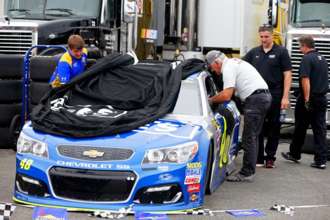 SPARTA, KY - JULY 08: Crew members work on the car of Jimmie Johnson, driver of the #48 Lowe's Chevrolet, after an incident during practice for the NASCAR Sprint Cup Series Quaker State 400 at Kentucky Speedway on July 8, 2016 in Sparta, Kentucky. (Photo by Brian Lawdermilk/NASCAR via Getty Images)