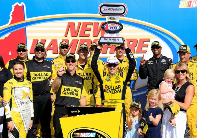 LOUDON, NH - JULY 17: Matt Kenseth, driver of the #20 Dollar General Toyota, celebrates in Victory Lane after winning the NASCAR Sprint Cup Series New Hampshire 301 at New Hampshire Motor Speedway on July 17, 2016 in Loudon, New Hampshire. (Photo by Chris Trotman/Getty Images)