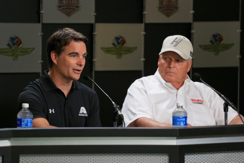 INDIANAPOLIS, IN - JULY 22:  (L-R) Jeff Gordon, driver of the #88 Axalta Chevrolet, and team owner Rick Hendrick speak to the media before practice for the NASCAR Sprint Cup Series Crown Royal presents the Combat Wounded Coalition 400 at the Brickyard at Indianapolis Motor Speedway on July 23, 2016 in Indianapolis, Indiana.  (Photo by Daniel Shirey/Getty Images)