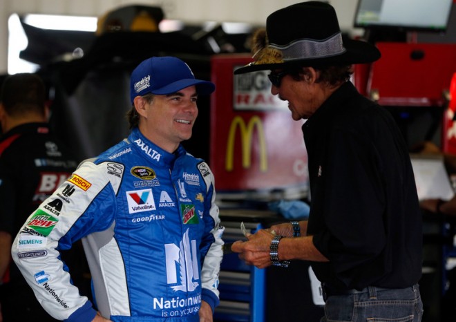 LONG POND, PA - JULY 29: (L-R) Jeff Gordon, driver of the #88 Nationwide Chevrolet, and NASCAR Hall of Fame driver Richard Petty talk in the garage area during practice for the NASCAR Sprint Cup Series Pennsylvania 400 at Pocono Raceway on July 29, 2016 in Long Pond, Pennsylvania. (Photo by Brian Lawdermilk/Getty Images)