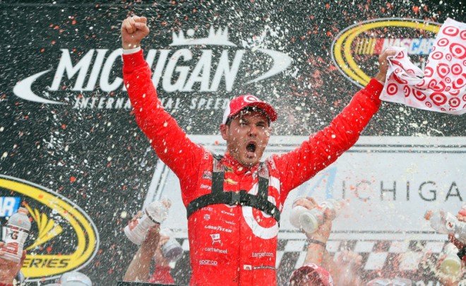 BROOKLYN, MI - AUGUST 28:  Kyle Larson, driver of the #42 Target Chevrolet, celebrates in victory lane after winning the NASCAR Sprint Cup Series Pure Michigan 400 at Michigan International Speedway on August 28, 2016 in Brooklyn, Michigan.  (Photo by Brian Lawdermilk/NASCAR via Getty Images)