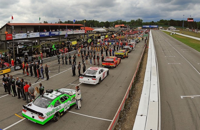 LEXINGTON, OH - AUGUST 13:  A general view of the grid during the anthem before the 4th annual NASCAR XFINITY Series Mid-Ohio Challenge at Mid-Ohio Sports Car Course on August 13, 2016 in Lexington, Ohio.  (Photo by Jonathan Moore/Getty Images)