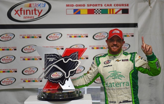 LEXINGTON OH - AUGUST 13: Justin Marks driver of the #42 Katerra Chevrolet celebrates in Victory Lane after taking first place in the 4th annual NASCAR XFINITY Series Mid-Ohio Challenge at Mid-Ohio Sports Car Course on August 13, 2016 in Lexington Ohio. (Photo by Jonathan Moore/Getty Images)