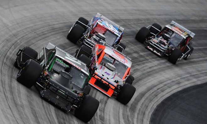 BRISTOL, TN. - AUGUST 20: Justin Bonsignore, driver of the #51 chem3.com Chevrolet, leads a pack of cars during the NASCAR Whelen Modified Tour Bush's Beans 150 at Bristol Motor Speedway on August 20, 2014 in Bristol, Tennessee. (Photo by Rainier Ehrhardt/NASCAR via Getty Images)