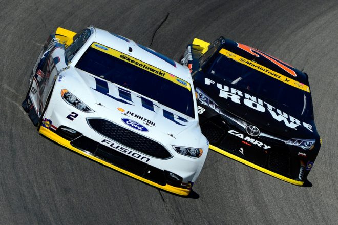 JOLIET, IL - SEPTEMBER 18:  Brad Keselowski, driver of the #2 Miller Lite Ford, races Martin Truex Jr, driver of the #78 Furniture Row/Denver Mattress Toyota, during the NASCAR Sprint Cup Series Teenage Mutant Ninja Turtles 400 at Chicagoland Speedway on September 18, 2016 in Joliet, Illinois.  (Photo by Robert Laberge/Getty Images)