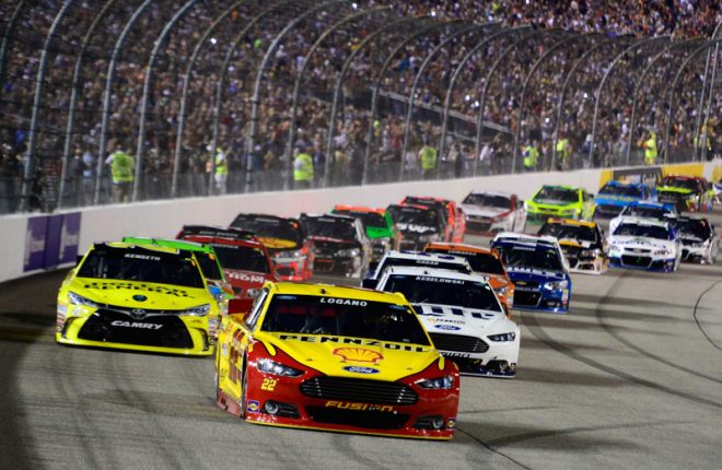 RICHMOND, VA - SEPTEMBER 12:  Joey Logano, driver of the #22 Shell Pennzoil Ford, leads the field past the green flag to start the NASCAR Sprint Cup Series Federated Auto Parts 400 at Richmond International Raceway on September 12, 2015 in Richmond, Virginia.  (Photo by Robert Laberge/Getty Images)