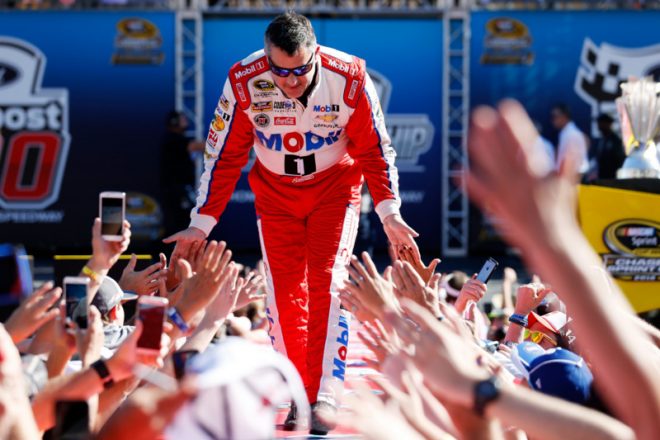 HOMESTEAD, FL - NOVEMBER 20: Tony Stewart, driver of the #14 Always a Racer/Mobil 1 Chevrolet, greets fans as he is introduced prior to the NASCAR Sprint Cup Series Ford EcoBoost 400 at Homestead-Miami Speedway on November 20, 2016 in Homestead, Florida. (Photo by Chris Trotman/Getty Images)