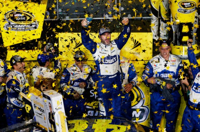 HOMESTEAD, FL - NOVEMBER 20: Jimmie Johnson, driver of the #48 Lowe's Chevrolet, celebrates in Victory Lane after winning the NASCAR Sprint Cup Series Ford EcoBoost 400 and the 2016 NASCAR Sprint Cup Series Championship at Homestead-Miami Speedway on November 20, 2016 in Homestead, Florida. Johnson wins a record-tying 7th NASCAR title. (Photo by Chris Trotman/Getty Images)