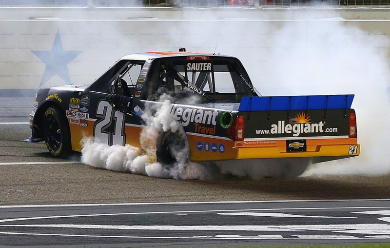 FORT WORTH, TX - NOVEMBER 04: Johnny Sauter, driver of the #21 Allegiant Travel Chevrolet, celebrates with a burnout after winning the NASCAR Camping World Truck Series Striping Technology 350 at Texas Motor Speedway on November 4, 2016 in Fort Worth, Texas. (Photo by Matt Sullivan/NASCAR via Getty Images)