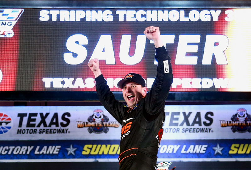 FORT WORTH, TX - NOVEMBER 04: Johnny Sauter, driver of the #21 Allegiant Travel Chevrolet, celebrates in Victory Lane after winning the NASCAR Camping World Truck Series Striping Technology 350 at Texas Motor Speedway on November 4, 2016 in Fort Worth, Texas. (Photo by Matt Sullivan/NASCAR via Getty Images)