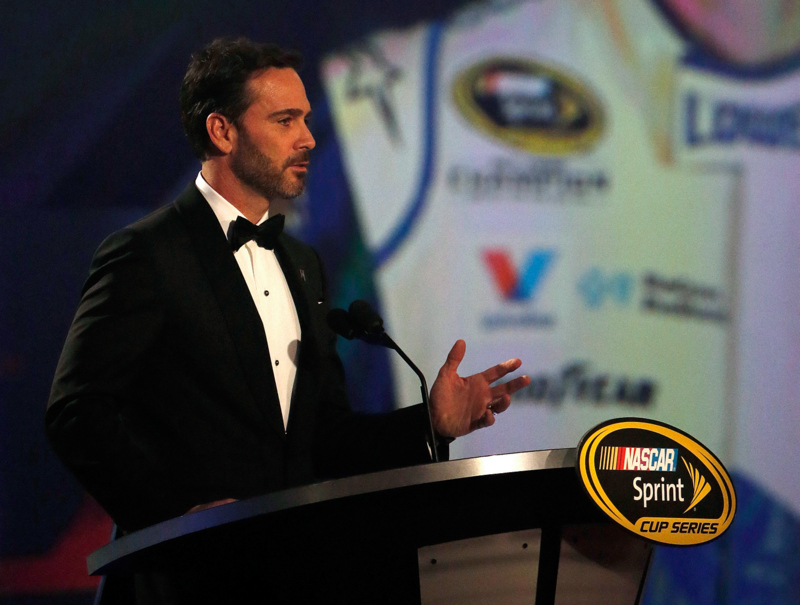 LAS VEGAS, NV - DECEMBER 02:  NASCAR Sprint Cup Series Champion Jimmie Johnson speaks during the 2016 NASCAR Sprint Cup Series Awards show at Wynn Las Vegas on December 2, 2016 in Las Vegas, Nevada.  (Photo by Brian Lawdermilk/Getty Images)
