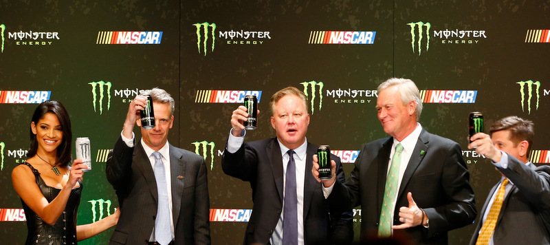 LAS VEGAS, NV - DECEMBER 01:  Steve Phelps, Brian France, Mark Hall and Mitch Covington toast during a press conference as NASCAR and Monster Energy announce premier series entitlement partnership at Wynn Las Vegas on December 1, 2016 in Las Vegas, Nevada. Monster Energy, which will begin its tenure as naming rights partner on Jan. 1, 2017, will become only the third company to serve as the entitlement sponsor in NASCAR premier series history, following RJ Reynolds and Sprint/Nextel.  (Photo by Jonathan Ferrey/Getty Images)