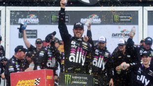 Jimmie Johnson wins rain-shortened Advance Auto Parts Clash